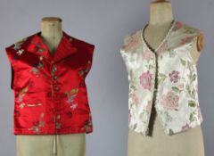 A collection of gentlemen's decorative waistcoats, some plain, some patterned and striped, various