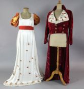 Centerentola: Two red crushed velvet tail jackets with appliqué embroidered white collar, together