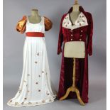 Centerentola: Two red crushed velvet tail jackets with appliqué embroidered white collar, together