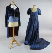Don Pasquale: A rail of petrol blue dresses, red, purple and pink embroidered dresses, velvet and