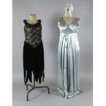 A collection of non specific theatrical costumes, in velvets, lurex and satins, various sizes