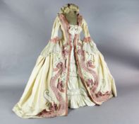 Countess Almaviva's costume for The Marriage of Figaro. A cream silk dress, under skirt, looped