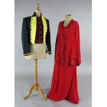 Tosca: A rail of yellow and maroon jackets, a red evening dress and jacket, white cotton