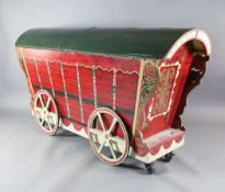 Elisir L'Amore: Dr Dulcamara's stage prop carriage from which his assistant pops out, together