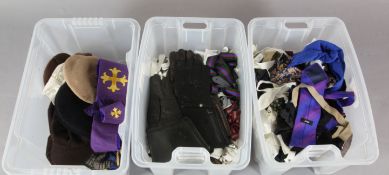 A collection of gentlemen's ties, bow ties, flat caps, belts and braces