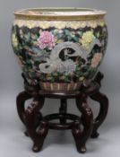 A Chinese fish bowl and stand overall height 54cm