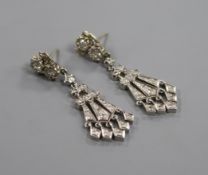 A pair of Art Deco style white metal and diamond set fan shape drop earrings, approx. 48mm.