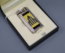 A Dunhill unique enamelled lighter, papers and case