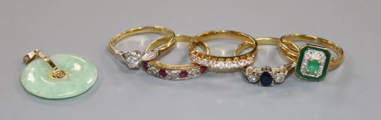 Five assorted 18ct gold and gem set rings including ruby and diamond half hoop and emerald and