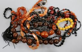 A quantity of assorted bead necklaces including agate and simulated amber etc.