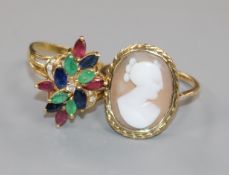 An 18k and multi gem set cocktail ring and a yellow metal and cameo ring.