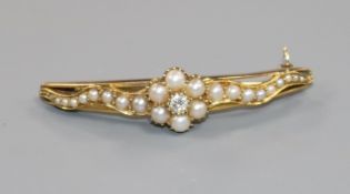 An early-mid 20th century yellow metal, split pearl and diamond demi-lune bar brooch, 46mm.