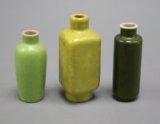 Two Chinese monochrome glazed porcelain snuff bottles and a yellow crackle-glaze miniature vase,