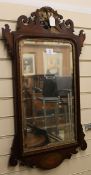 A George III mahogany and marquetry fret cut wall mirror W.51cm