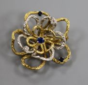 A yellow and white metal open work flower head brooch, set with sapphires and diamonds, 39mm, 21.6