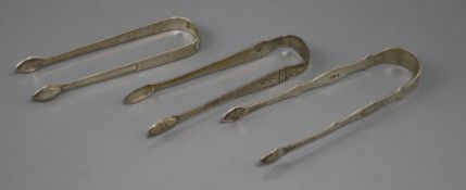 Three pairs of Georgian silver sugar tongs.