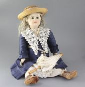 A Rabery et Delphieu bisque headed doll, marked 'R 2 D', with pale blue fixed eyes, closed mouth and