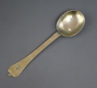 A late 17th/early 18th century silver giltdog nose spoon, indistinct marks, 18cm.