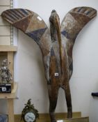 A large Senufo effigy carving of a standing bird height 127cm