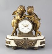 An early 20th century French ormolu mounted marble mantel clock, retailed by Charles Frodsham, the