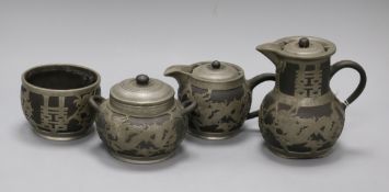 A Chinese pewter and pottery part tea set, by Hsin Ho Cheng tallest 14.5cm