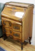 A 19th century North Italian banded and inlaid walnut bureau with ormolu mounts W.75cm