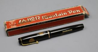 A boxed Sailor Namiki style lacquered fountain pen with 14ct gold nib inscribed "Sailor regd