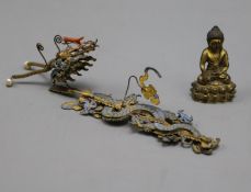 A 19th century Chinese miniature gilt bronze figure of Buddha Shakyamuni and a gilt metal 'dragon'