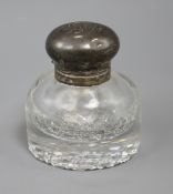 A Victorian silver mounted circular glass inkwell, 11.1cm.