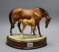 A Royal Worcester figure 'Princess Grace and foal' height incl. stand 23cm