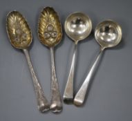 A pair of Georgian silver "berry" spoons and a pair of George III silver sauce ladles, 6.5 oz.