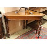A Victorian mahogany triangular corner table W.111cm