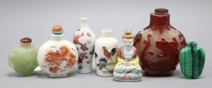 A group of 19th and 20th century Chinese porcelain and glass snuff bottles tallest 7cm