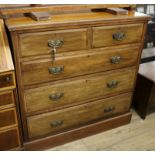 An Edwardian walnut chest of five drawers W.107cm