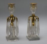 A pair of brass mounted glass lustre candlesticks height 25cm