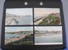 A postcard album of views of mostly Eastbourne etc (approx. 128 on sheets) 21 loose and one First