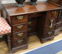 A rare Anglo Indian padouk wood campaign kneehole desk, mid 18th century W.96cm