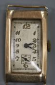 An early 20th century 9ct gold rectangular cased manual wind wrist watch, (no strap).