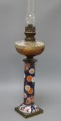 An Imari based oil lamp height 74cm incl. shade