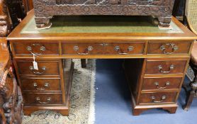 A George III style walnut and burr walnut pedestal desk W.137cm