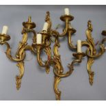 Two pairs of Louis XV style ormolu two branch sconces length 39.5cm