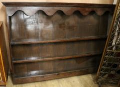 An 18th century style oak plate rack W.180cm