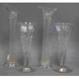 A pair of tall fluted cut glass vases and a pair of cut glass trumpet vases tallest 41cm