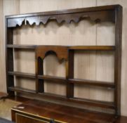 An 18th century style oak plate rack W.170cm