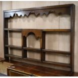 An 18th century style oak plate rack W.170cm