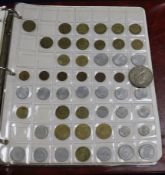 Two albums of UK and world coins, 18th-20th century.