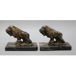 A pair of Art Deco bison bookends, on marble bases height 13cm