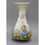 A 19th century large French enamelled white glass vase