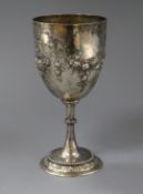A Victorian embossed silver goblet, Arthur Sibley, London, 1873, 17cm, 6.5 oz.