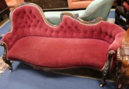 A Victorian mahogany button back scroll end settee W.176cm